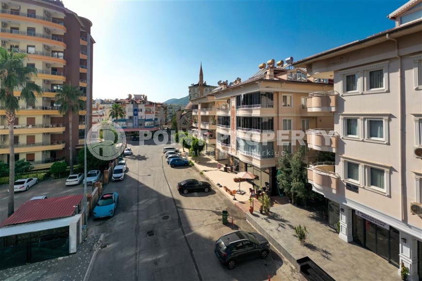 Modern apartment with spacious glazed balconies, five minutes walk from the center of Alanya-id-6071-photo-16