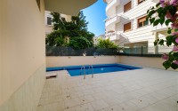 Modern apartment with spacious glazed balconies, five minutes walk from the center of Alanya-id-6071-photo-17