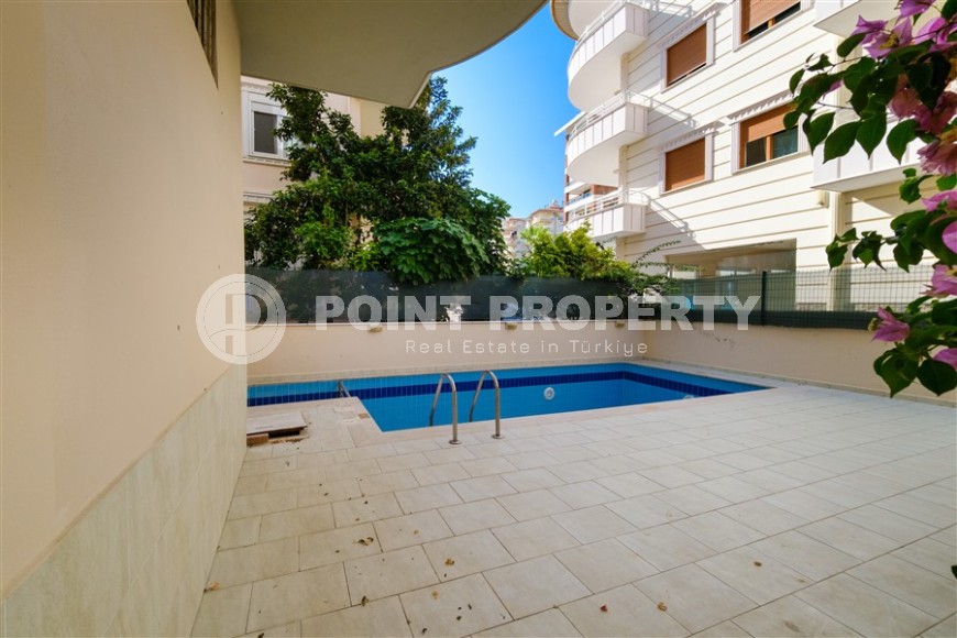 Modern apartment with spacious glazed balconies, five minutes walk from the center of Alanya-id-6071-photo-17