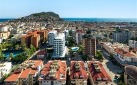 Modern apartment with spacious glazed balconies, five minutes walk from the center of Alanya-id-6071-photo-19