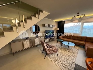 Spacious two-level apartment 4+1, on an area of 210 m2, 50 meters from the beach, in the center of the Kestel area-id-6082-photo-1