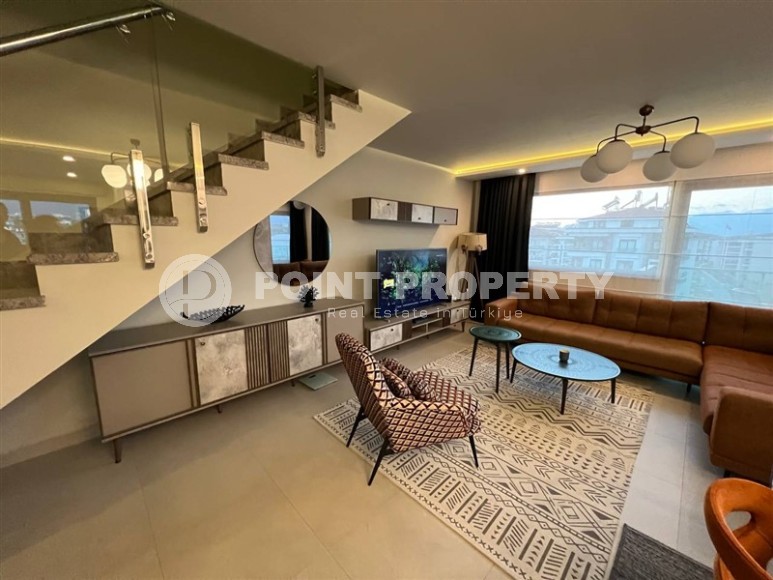 Spacious two-level apartment 4+1, on an area of 210 m2, 50 meters from the beach, in the center of the Kestel area-id-6082-photo-1