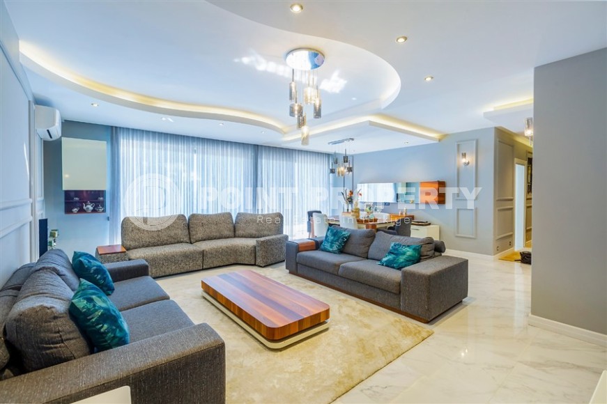 Дуплекс с дизайнерским ремонтом, на 6-м этаже с мансардой, в спокойном районе Аланьи - Чиплаклы-id-6092-фото-2