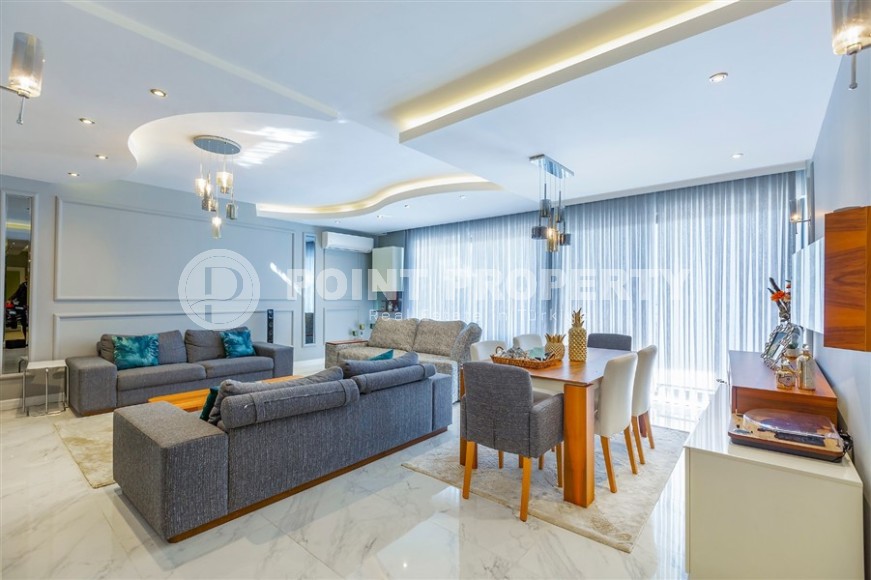 Дуплекс с дизайнерским ремонтом, на 6-м этаже с мансардой, в спокойном районе Аланьи - Чиплаклы-id-6092-фото-3