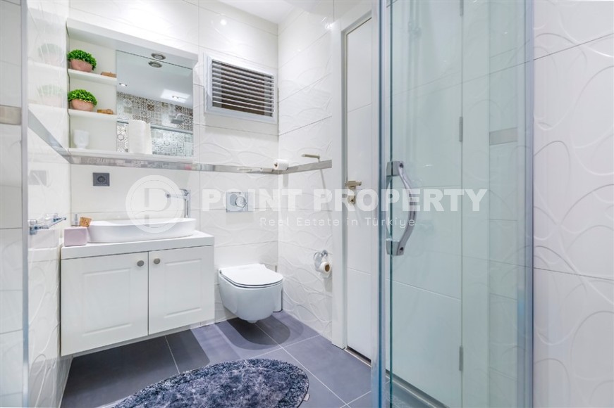 Дуплекс с дизайнерским ремонтом, на 6-м этаже с мансардой, в спокойном районе Аланьи - Чиплаклы-id-6092-фото-16