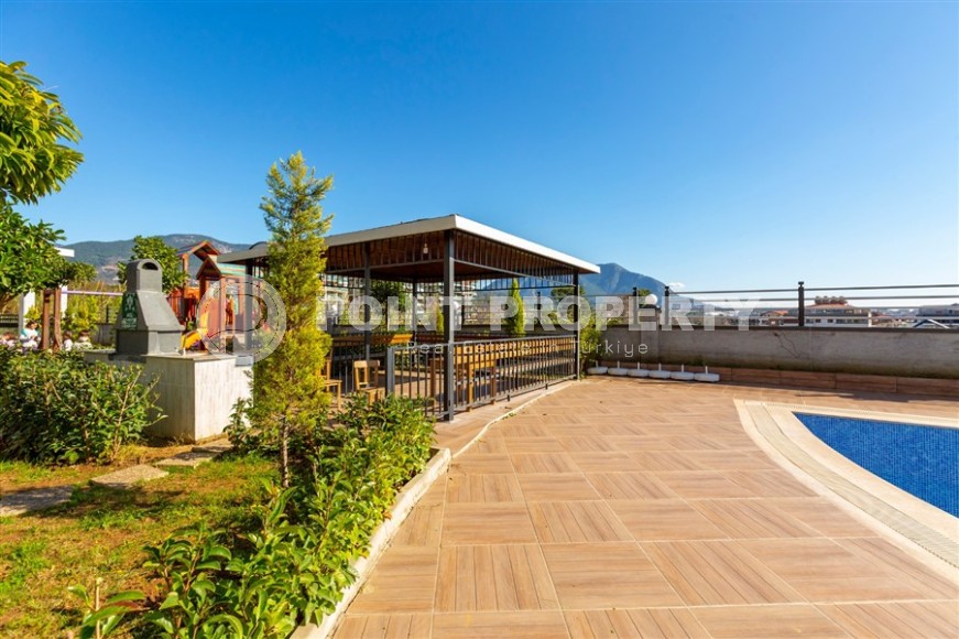 Дуплекс с дизайнерским ремонтом, на 6-м этаже с мансардой, в спокойном районе Аланьи - Чиплаклы-id-6092-фото-31