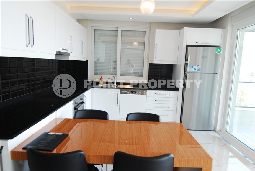 Apartment with modern design on the first line from the sea, in a picturesque, quiet area of Alanya - Kestel-id-6100-photo-4