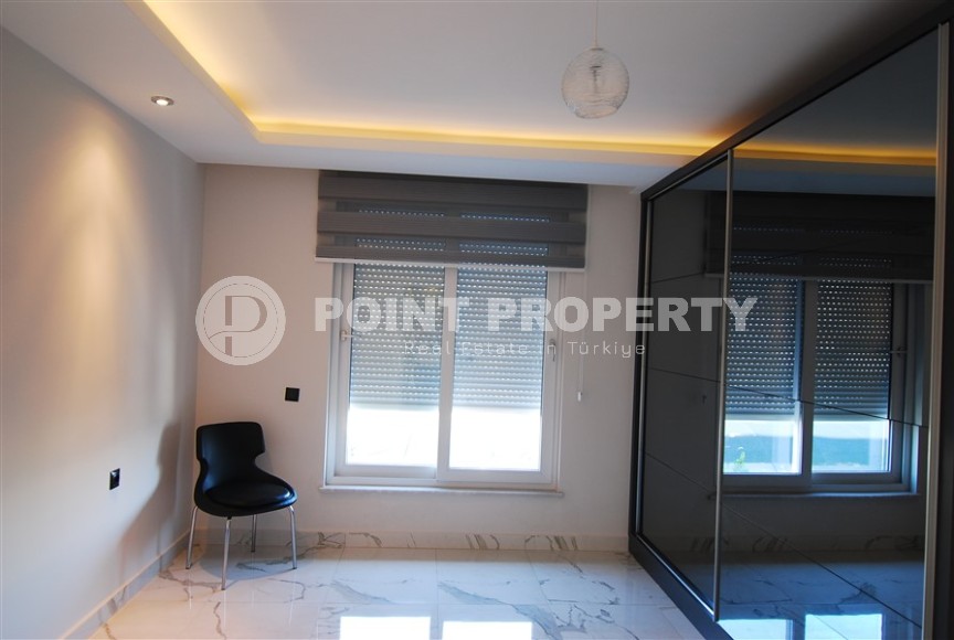 Apartment with modern design on the first line from the sea, in a picturesque, quiet area of Alanya - Kestel-id-6100-photo-9