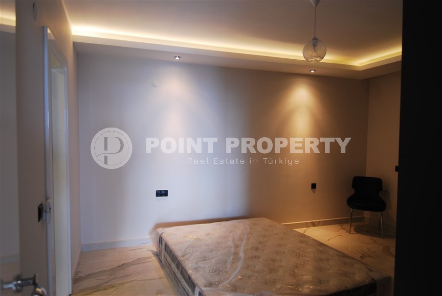 Apartment with modern design on the first line from the sea, in a picturesque, quiet area of Alanya - Kestel-id-6100-photo-10