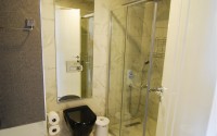 Apartment with modern design on the first line from the sea, in a picturesque, quiet area of Alanya - Kestel-id-6100-photo-12