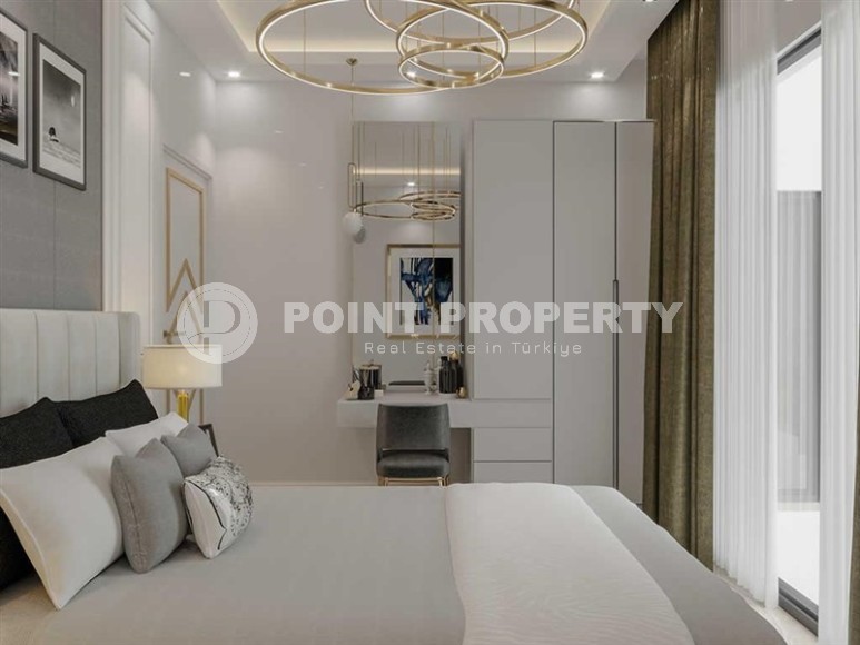 New 1+1 apartment, with a total area of 65 m2, 400 meters from the sea, in a quiet area of Alanya - Tosmur-id-6103-photo-4