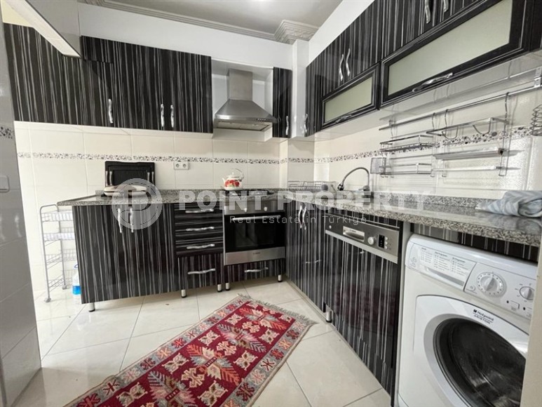 Благоустроенная меблированная квартира на первой линии от моря, в центре Аланьи-id-6110-фото-3