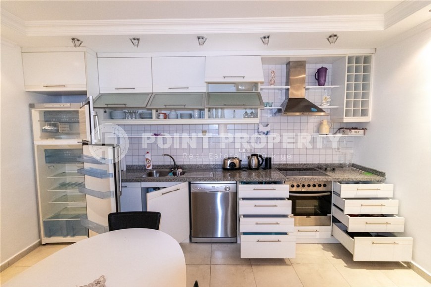 Inexpensive, spacious apartment, with furniture and household appliances, in a comfortable residential complex in the Mahmutlar area-id-6111-photo-4