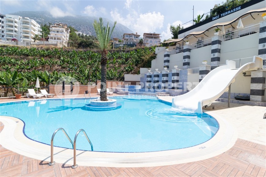 Inexpensive, spacious apartment, with furniture and household appliances, in a comfortable residential complex in the Mahmutlar area-id-6111-photo-15