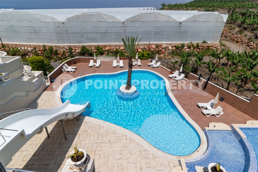 Inexpensive, spacious apartment, with furniture and household appliances, in a comfortable residential complex in the Mahmutlar area-id-6111-photo-17