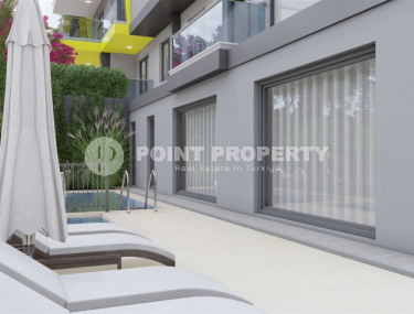 A cozy complex under construction in the Gazipasa area. Apartments at budget prices.-id-1064-photo-4