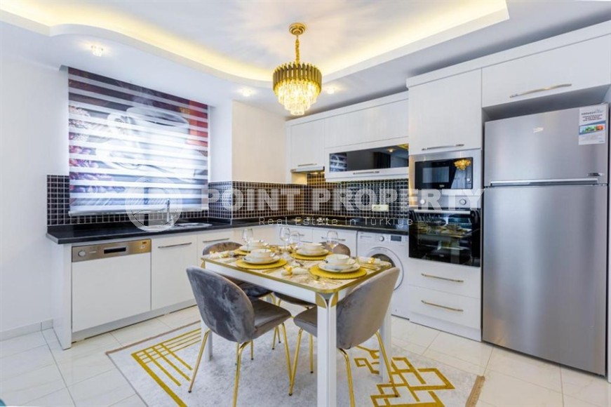 Comfortable apartment with modern furniture and household appliances, in the center of Mahmutlar-id-6124-photo-4