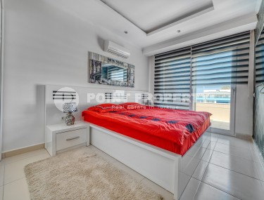 Светлая двухуровневая квартира на 5-м этаже с мансардой, в центре района Оба-id-6125-фото-2