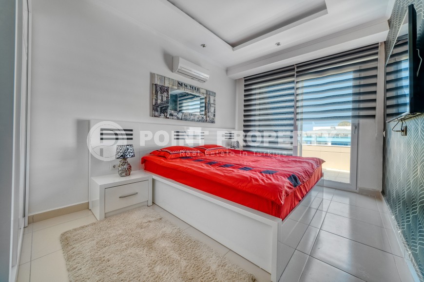 Светлая двухуровневая квартира на 5-м этаже с мансардой, в центре района Оба-id-6125-фото-2