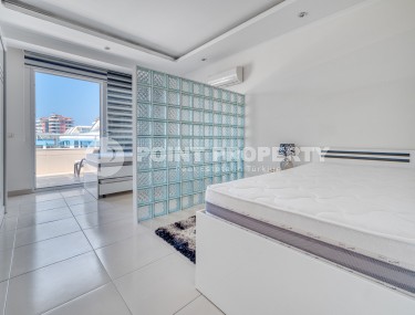 Светлая двухуровневая квартира на 5-м этаже с мансардой, в центре района Оба-id-6125-фото-3