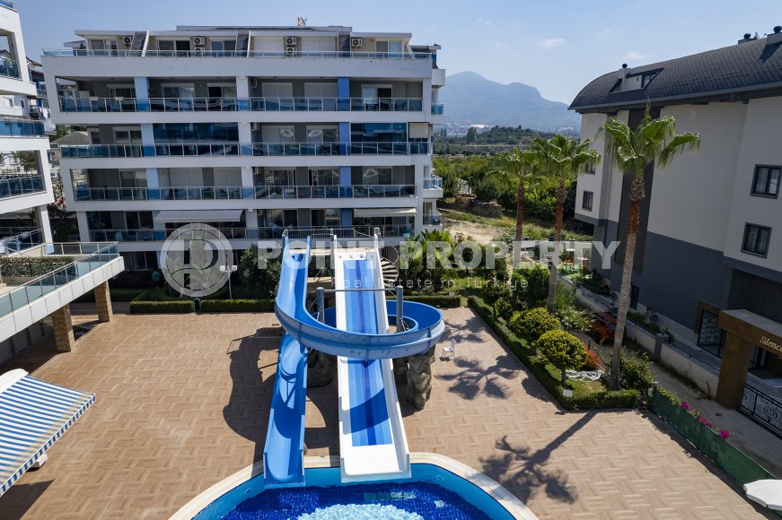 Светлая двухуровневая квартира на 5-м этаже с мансардой, в центре района Оба-id-6125-фото-12