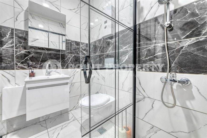 Стильная двухуровневая квартира с панорамным видом на горы, в центре популярного района Аланьи - Оба-id-6130-фото-11