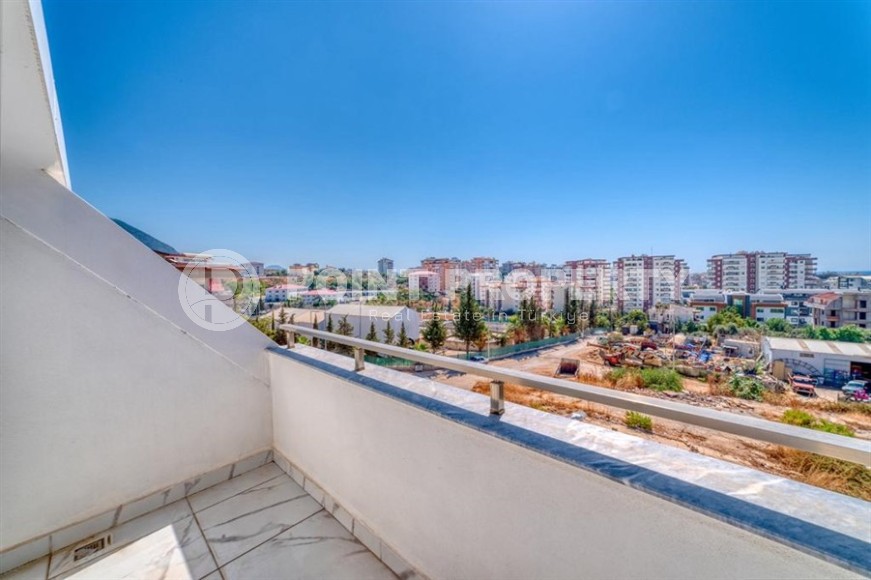 Стильная двухуровневая квартира с панорамным видом на горы, в центре популярного района Аланьи - Оба-id-6130-фото-17