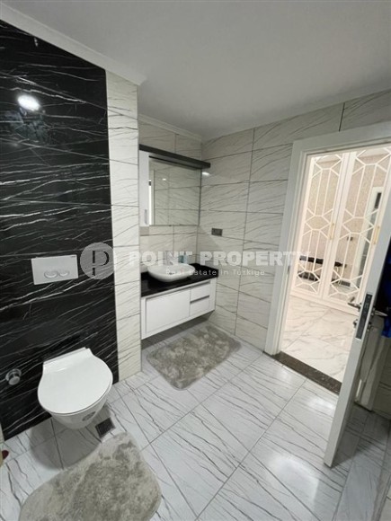 Spacious 4+1 apartment with a total area of 200 m2, 800 meters from the beach, in the Mahmutlar area-id-6137-photo-11