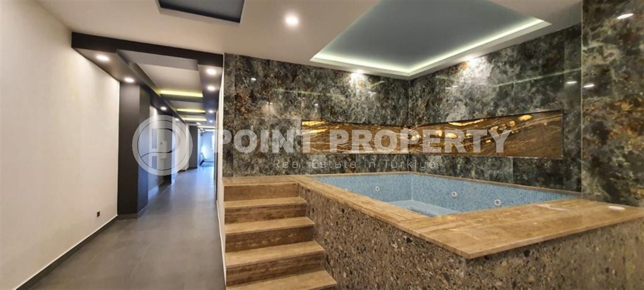 Spacious 4+1 apartment with a total area of 200 m2, 800 meters from the beach, in the Mahmutlar area-id-6137-photo-18