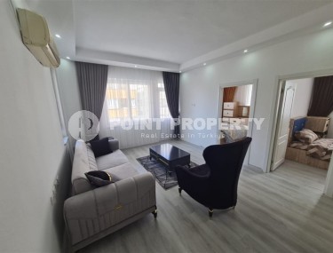 Благоустроенная меблированная квартира с двумя спальными комнатами, в спокойном районе Аланьи - Конаклы-id-6145-фото-2