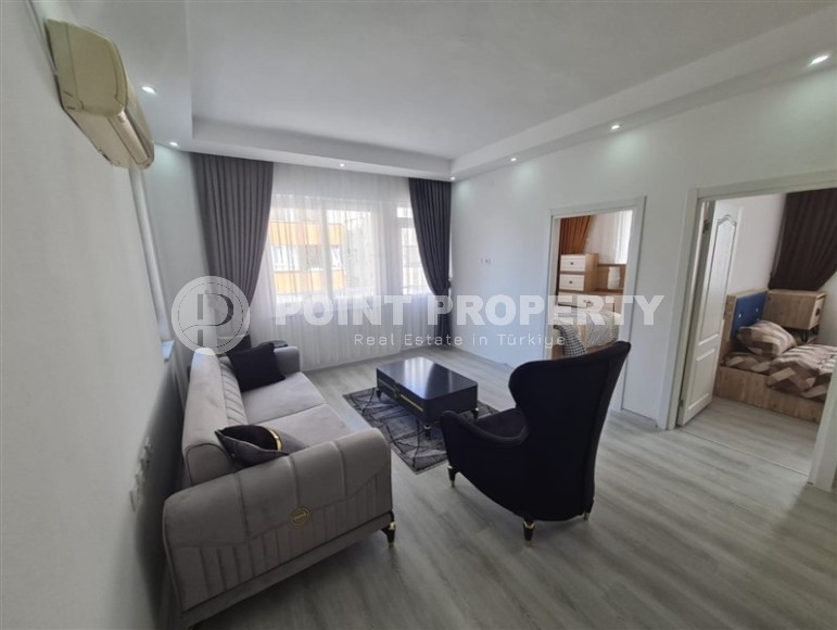 Благоустроенная меблированная квартира с двумя спальными комнатами, в спокойном районе Аланьи - Конаклы-id-6145-фото-2