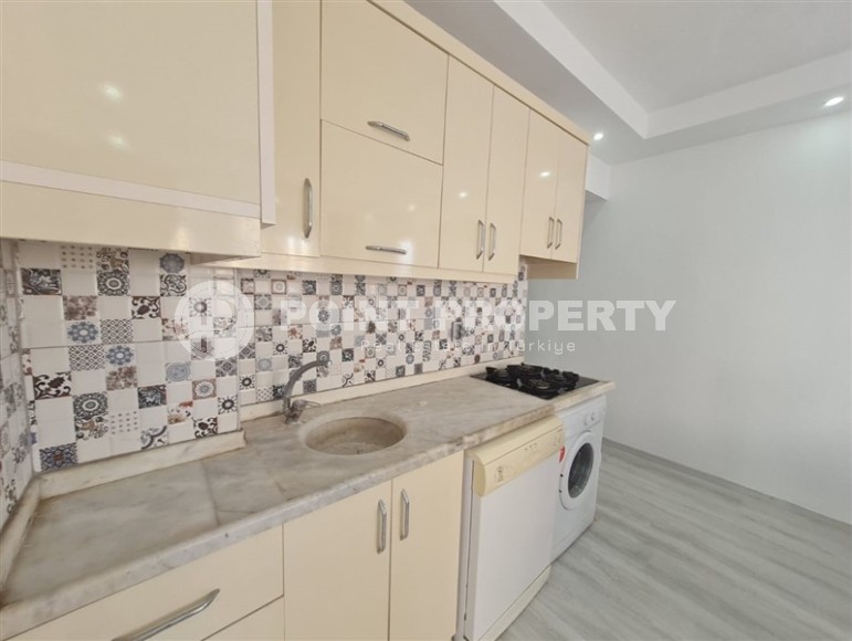 Благоустроенная меблированная квартира с двумя спальными комнатами, в спокойном районе Аланьи - Конаклы-id-6145-фото-3