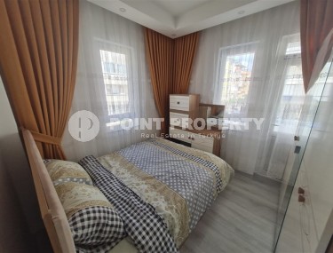 Благоустроенная меблированная квартира с двумя спальными комнатами, в спокойном районе Аланьи - Конаклы-id-6145-фото-4