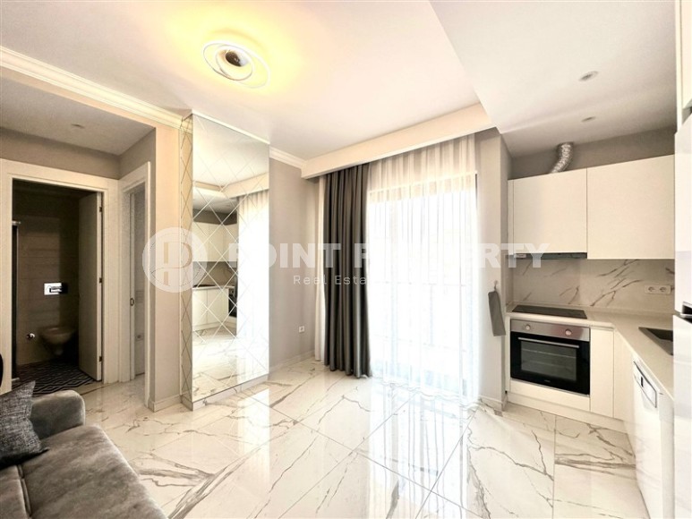 Компактная, комфортабельная квартира 1+1, на площади 40 м2, в 200 метрах от пляжа, в самом центре Аланьи-id-6151-фото-2