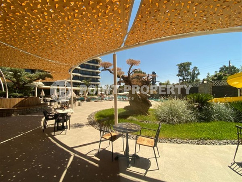 Меблированная трехкомнатная квартира, 122м², на первой береговой линии в районе Алании - Каргыджак.-id-1486-фото-32