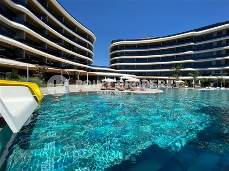 Меблированная трехкомнатная квартира, 122м², на первой береговой линии в районе Алании - Каргыджак.-id-1486-фото-38