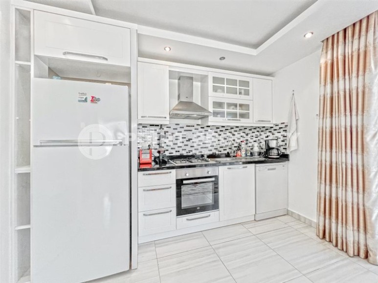 Уютная, светлая квартира 1+1, на площади 62 м2, в центре современного, развитого района Аланьи - Махмутлар-id-6167-фото-4