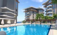 Двухуровневая трехкомнатная квартира, 180м², в новом комплексе в 500м от моря в районе Алании - Каргыджак-id-1487-фото-10