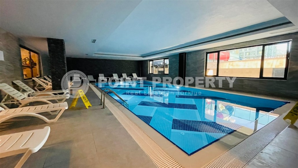 Квартира в современном жилом комплексе, в 100 метрах от моря, в центре живописного района Аланьи - Каргыджак-id-6176-фото-12