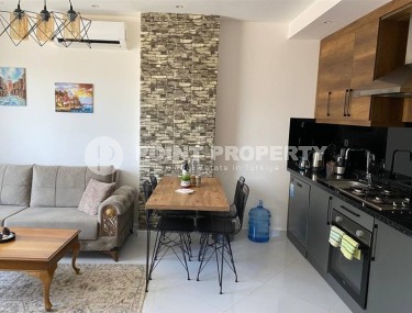 Small stylish apartment 1+1, on an area of 55 m2, in the center of the popular area of Alanya - Mahmutlar-id-6177-photo-2