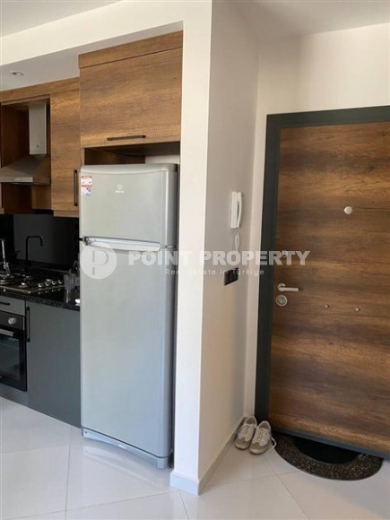 Small stylish apartment 1+1, on an area of 55 m2, in the center of the popular area of Alanya - Mahmutlar-id-6177-photo-3