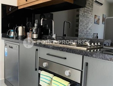 Small stylish apartment 1+1, on an area of 55 m2, in the center of the popular area of Alanya - Mahmutlar-id-6177-photo-4