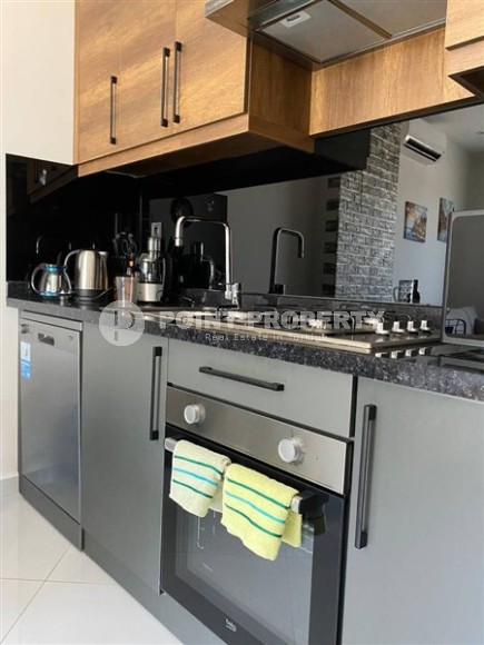 Small stylish apartment 1+1, on an area of 55 m2, in the center of the popular area of Alanya - Mahmutlar-id-6177-photo-4