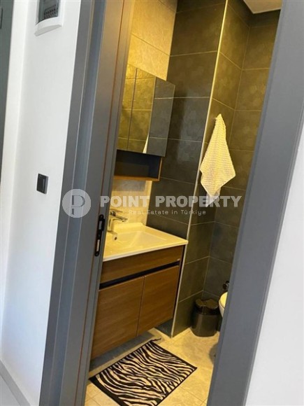 Small stylish apartment 1+1, on an area of 55 m2, in the center of the popular area of Alanya - Mahmutlar-id-6177-photo-6