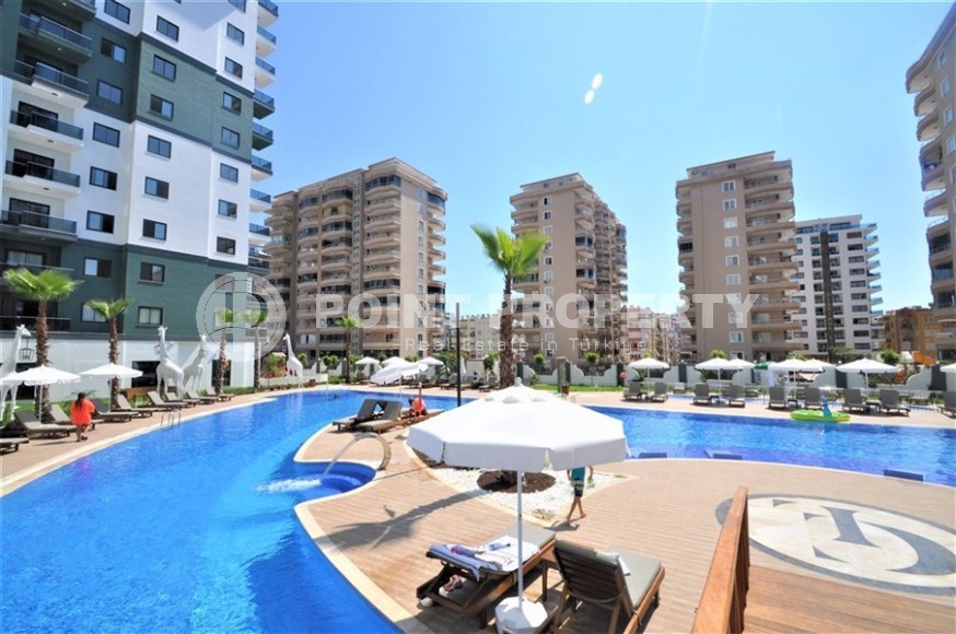 Small stylish apartment 1+1, on an area of 55 m2, in the center of the popular area of Alanya - Mahmutlar-id-6177-photo-9