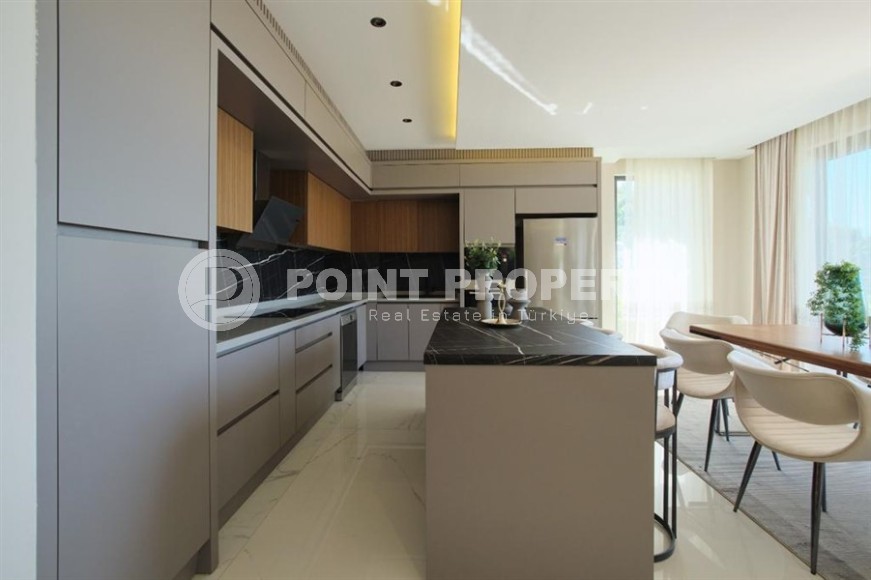 Превосходный проект роскошных вилл под гражданство в районе Каргыджак и всего в 600м от моря!-id-1017-фото-4