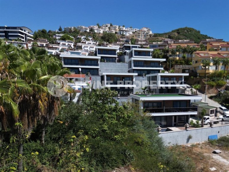 Превосходный проект роскошных вилл под гражданство в районе Каргыджак и всего в 600м от моря!-id-1017-фото-12