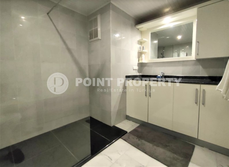 Современная квартира с мебелью и бытовой техникой, на первой линии от моря, в центре района Тосмур-id-6182-фото-8