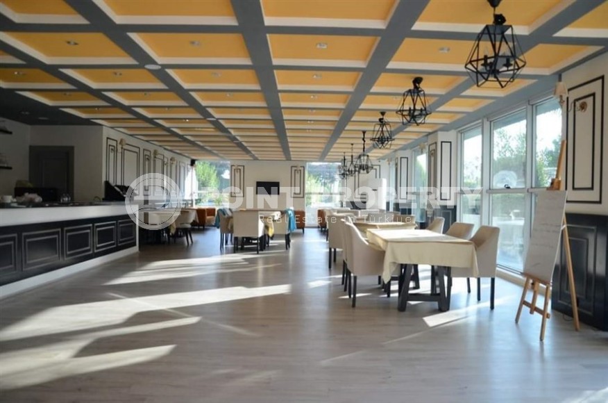 Современная квартира с мебелью и бытовой техникой, на первой линии от моря, в центре района Тосмур-id-6182-фото-16