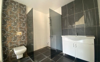 Двухуровневая трехкомнатная квартира, 180м², в новом комплексе в 500м от моря в районе Алании - Каргыджак-id-1487-фото-34